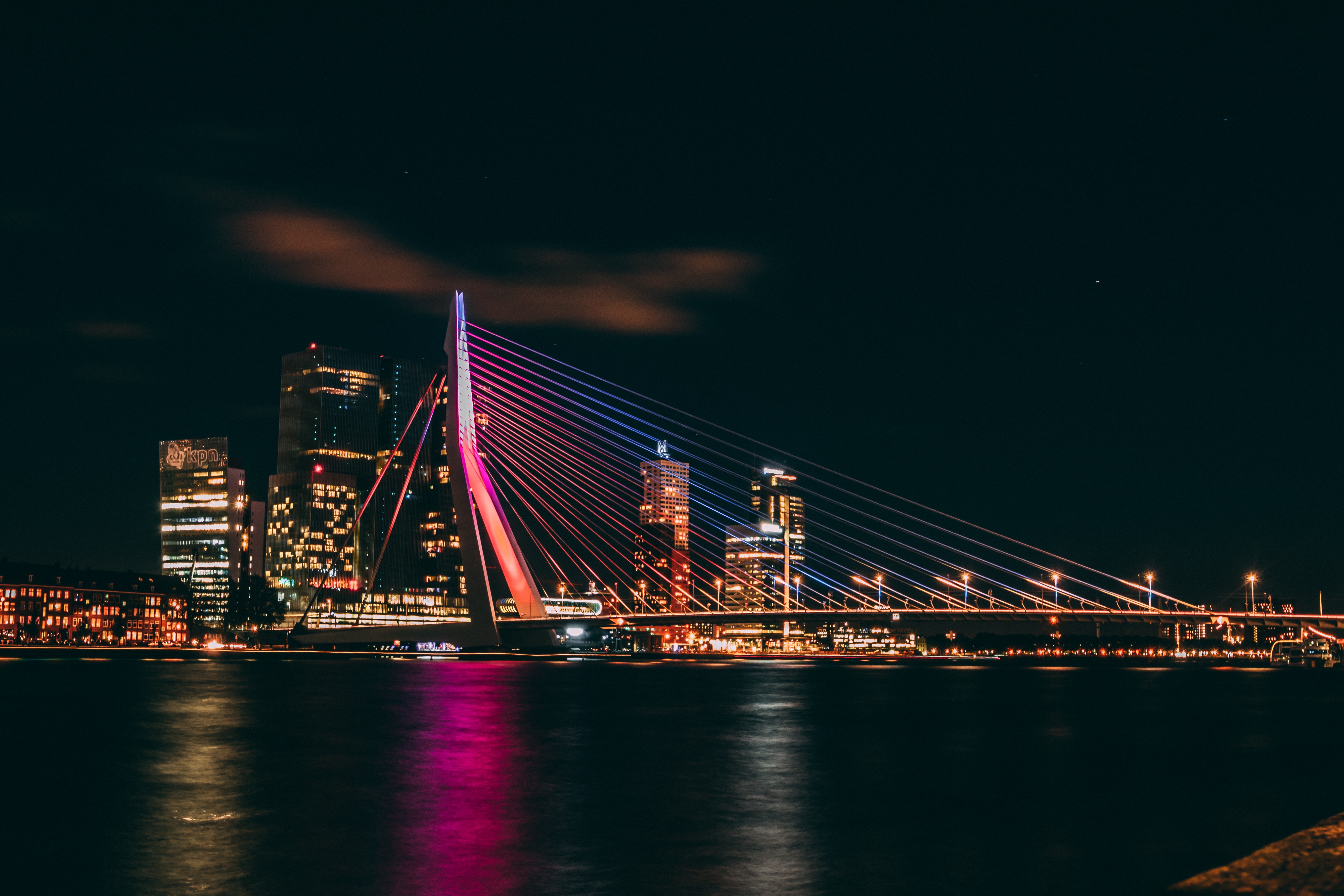 Photo of the Eramus Bridge in Rotterdam, The Netherlands, at night